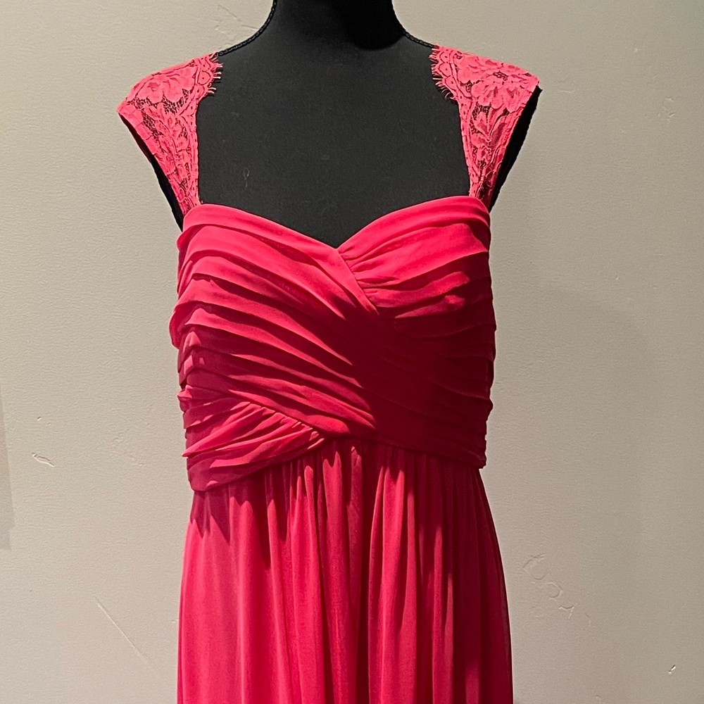 Beautiful full-length gown. Size 14 with ample space for bust. Lined.